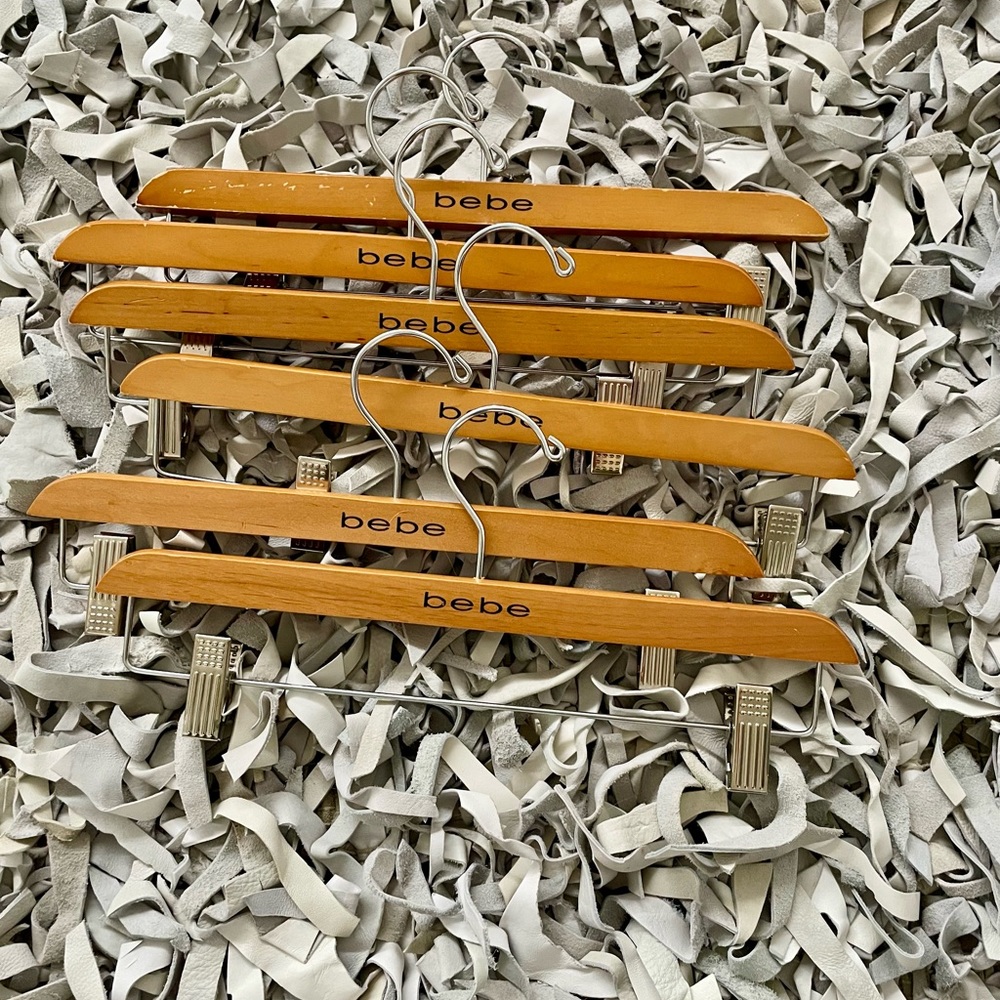 Classic BeBe brand wooden skirt/pant hanger six for $15